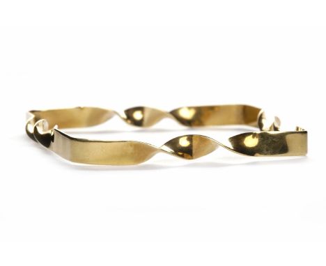 UNMARKED SHAPED BANGLE
of square form, with twists, 65mm across, 9.1g