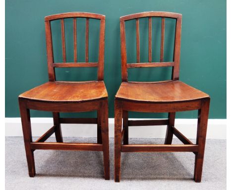 A set of six George III ash and elm stick back dining chairs, with solid dish seats and tapering square supports (6).