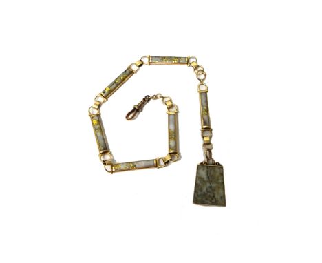 A gold and native gold in quartz watch chain, in a baton shaped link design, with a gold mounted native gold in quartz panel 