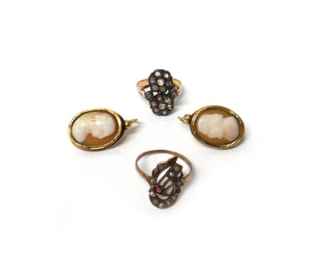 A rose diamond set ring, in a twin cluster design, ring size K and a half, another gem set ring and a pair of gold mounted ov