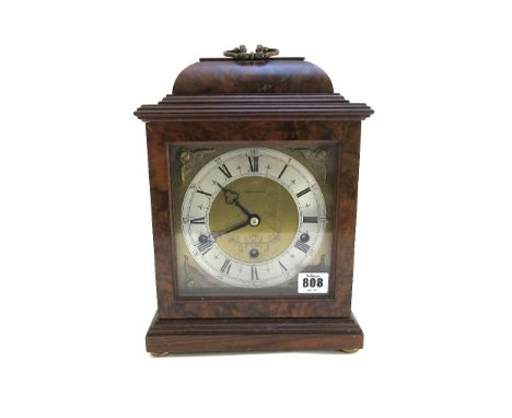 An Elliot walnut cased mantel clock with an eight day Westminster chiming three train movement, circa 1960, retailed by Mappi