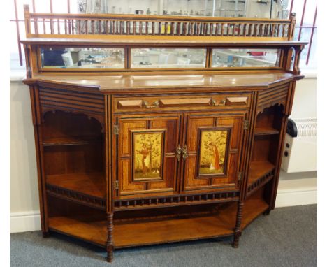 After Bruce Talbert; a Victorian mahogany, ebonised and painted cabinet, the mirror panelled raised back above breakfront bas