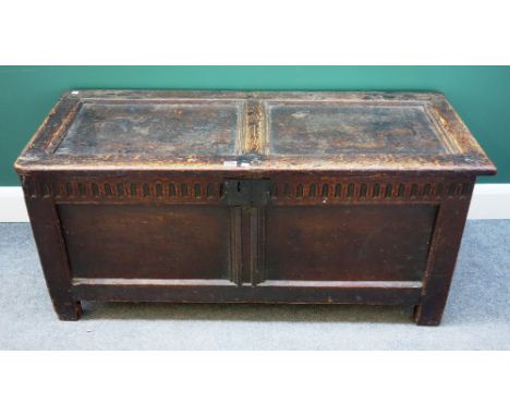 A 17th century oak coffer, with double panel lid and front, on stile feet, 120cm wide x 51cm deep.