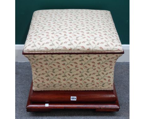 A Victorian mahogany framed pouffe of lozenge form, on stepped base, 54cm wide x 50cm high.