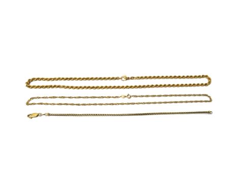 A gold ropetwist link neckchain, detailed 375, on a gilt clasp, detailed 925, a 9ct gold multiple link neckchain, with a bolt