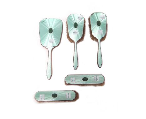 A lady's silver and pale green enamel mounted and jade set five piece Art Deco dressing set, comprising; a hand mirror, a pai