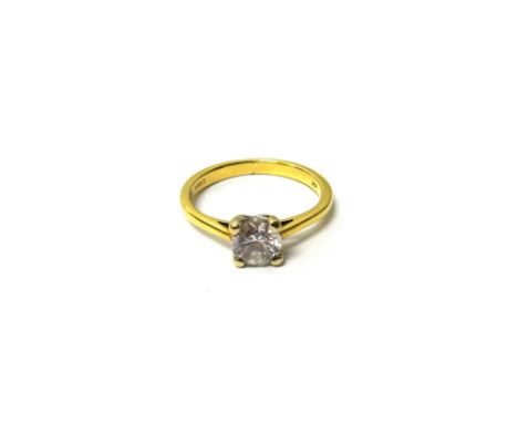 An 18ct gold and diamond set single stone ring, claw set with a circular cut diamond, detailed '18k', the diamond weighs appr