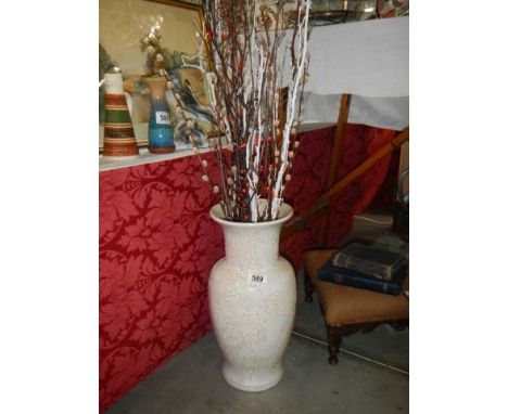 A tall ceramic vase.