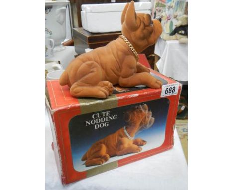 A vintage boxed 'Cute Nodding Dog'.
