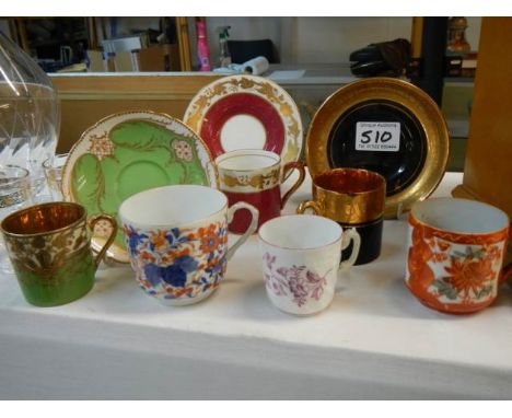 Three tea cups and saucers together with three tea cups.