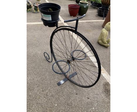 A Penny farthing style planter