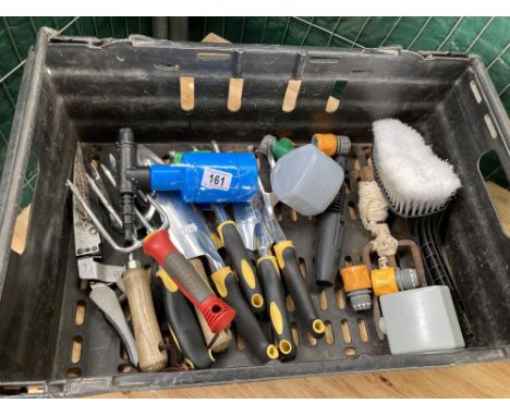 A box of gardening tools