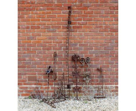 ANTIQUE WROUGHT IRON ARCHITECTURAL ELEMENTS to include brackets and a finial 