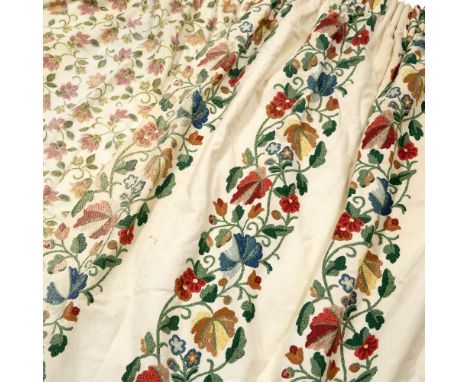 A PAIR OF EMBROIDERED OR CREWEL WORK PATTERN PRINTED CURTAINS  on a cream ground 118cm in the drop x 180cm wide per curtain a