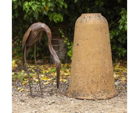 A 20TH CENTURY TERRACOTTA DOME TOPPED PLANTER 74cm high and an artistic metal sculpture of a heron feeding, 61cm high overall