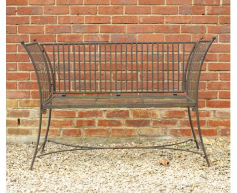 A CONTEMPORARY WROUGHT METAL TWO SEATER SLATTED GARDEN BENCH 129cm wide x 45cm deep x 89cm high