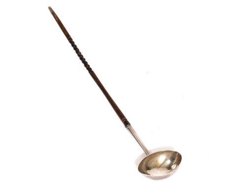 A GEORGE II TODDY LADLE circa 1735 by Joseph Saunders, the oval bowl with initials M.I.A and assay mark for London with a car
