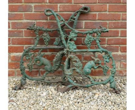 A PAIR OF VICTORIAN SCOTTISH RAILWAY BENCH ENDS with eagle finials, naturalistic form with grapevine and squirrel designs, ea