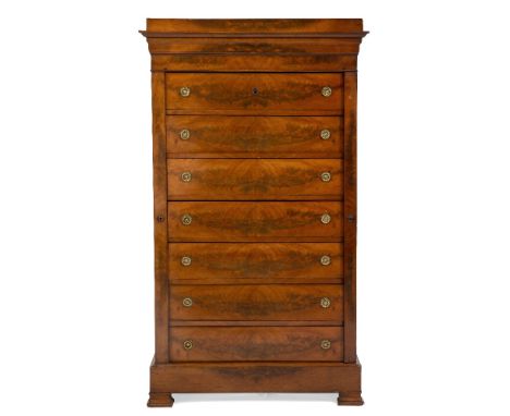 A 19TH CENTURY FRENCH MAHOGANY SEMANIER the seven drawers each with ring handles and with locking plate to the right hand sid