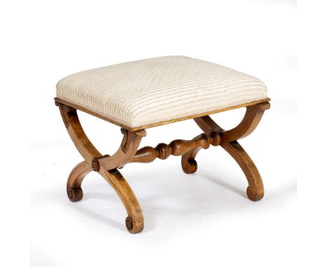 A REGENCY MAHOGANY X FRAMED STOOL with overstuffed upholstered seat and scrolling feet, 52cm wide x 54.5cm deep x 46cm high