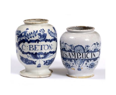 AN 18TH CENTURY ENGLISH DELFTWARE DRY DRUG JAR of ovoid form, decorated with birds and baskets of flowers and a cherub, inscr