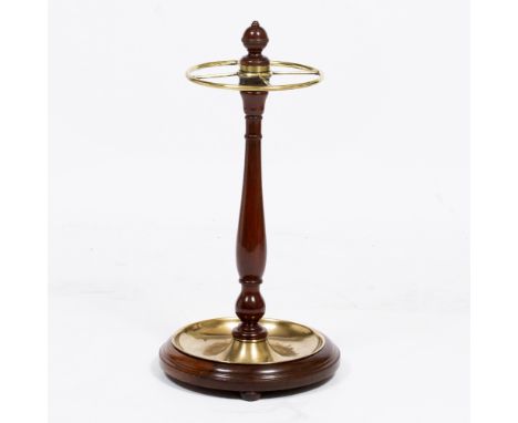 A TURNED HARDWOOD AND BRASS STICK STAND  with central finial 30cm diameter x 61cm high