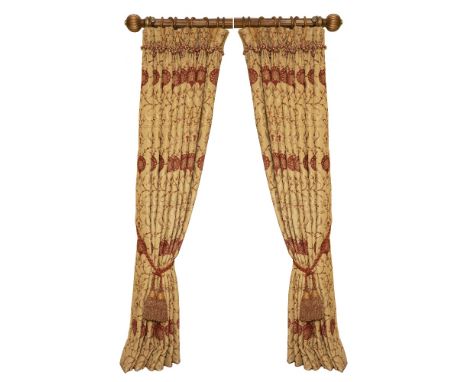 A PAIR OF GOLD GROUND INTERLINED CURTAINS decorated with peacock feather patterned flower, each curtain approximately 230cm h