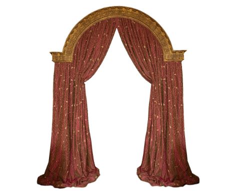 A PAIR OF GOLD AND RED COLOURED LEAF PATTERNED CURTAINS the shaped curtains approximately 3 metres high at their greatest and