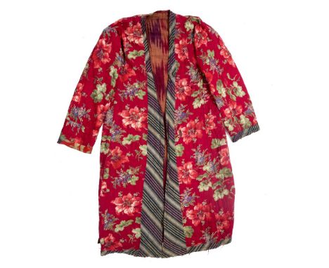 AN UZBECK SILK CHAPAN or cloak with printed floral design