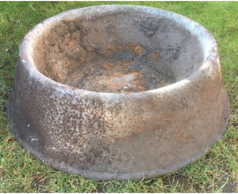 A CAST IRON CIRCULAR PIG FEEDING DISH or planter 60cm diameter x 16cm high 