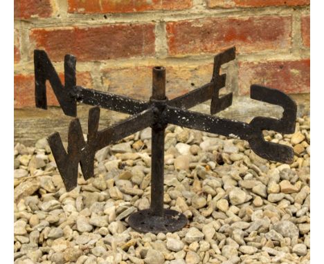 A BLACK WROUGHT IRON SET OF CARDINAL LETTERS from a weather vane, 28cm approximately overall