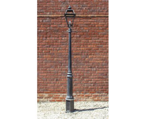 A BLACK PAINTED CAST ALUMINIUM DRIVEWAY LANTERN on a fluted lamp post approximately 277cm high
