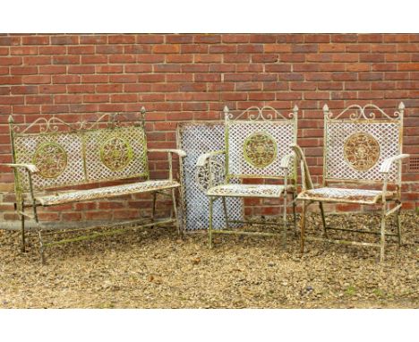 A FOLDING LATTICE WORK GARDEN TABLE 85cm wide with a matching folding bench and two chairs 