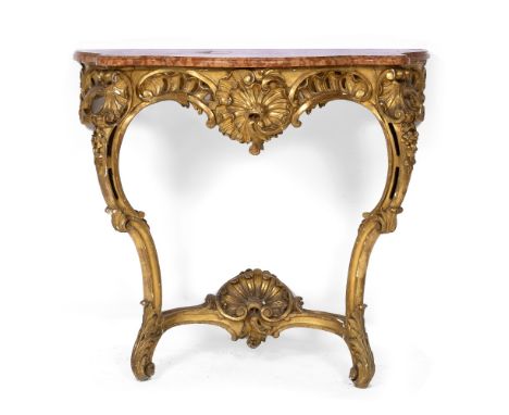 A 19TH CENTURY FRENCH GILT SERPENTINE PINK MARBLE TOPPED CONSOLE TABLE with shell carved pierce frieze, flower carved cabriol