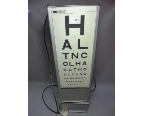 A 20th Century revolving opticians lamp from Clement Clarke.H-78cm, W-23cm, D-23cm 
