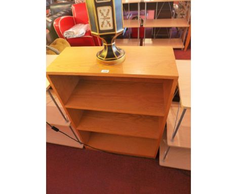 A mid 20th century light oak three tier bookcase. H-96 W-70cm D-30