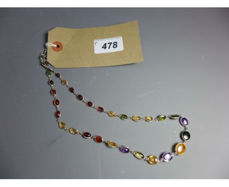 A silver, amethyst, zircon, garnet and citrine cabochon stone necklace