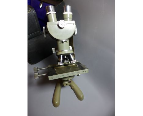 A Stanley Cox Ltd Galvanic and Sinusodial unit together with an Aerograph Devilbiss foot pump, a microscope, a vintage style 
