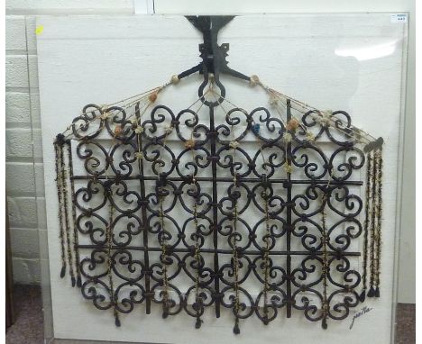 'Moroccan Iron Tith Sash', hand forged window cover mounted on silk panel signed, 'Omarts Inc. 2nd Street San Francisco Galle