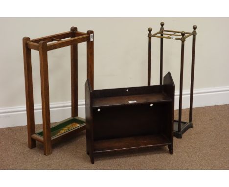 Late 19th century oak plank book rack (W44cm), brass Edwardian stick stand and an oak stick stand