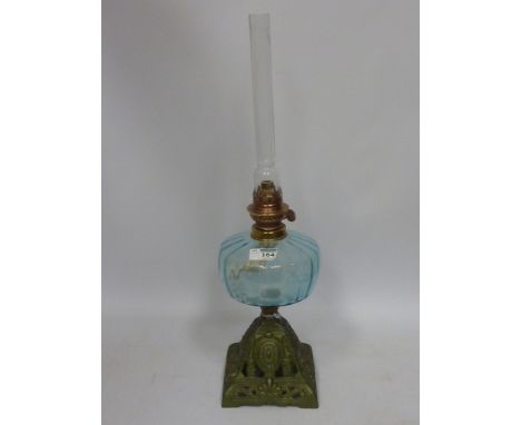 Early 20th century oil lamp with cast iron base H54cm 