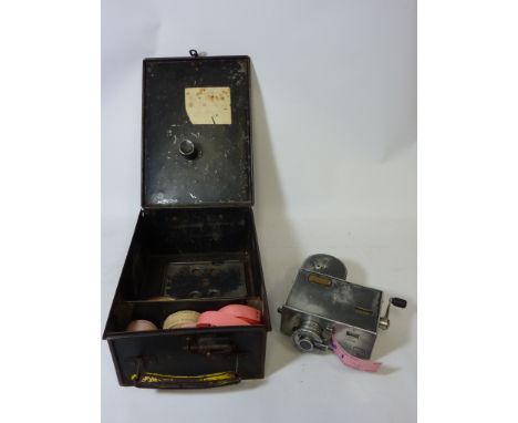 Bus conductor's vintage ticket machine with East Yorkshire Motor Services and West Midlands Transport ticket rolls, with orig