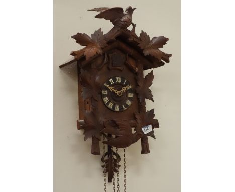 Early 20th century German cuckoo wall hanging clock, W34cm