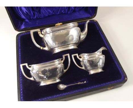 TEA SERVICE. An Edwardian silver tea service in presentation case (replacement spoon). Approx. 24oz.