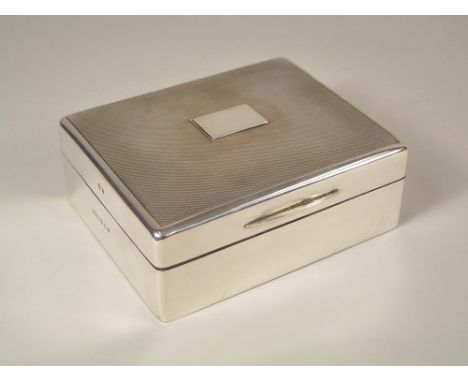 CIGARETTE BOX. A 1930's engine turned cigarette box. 8.5x10.5x4cm.