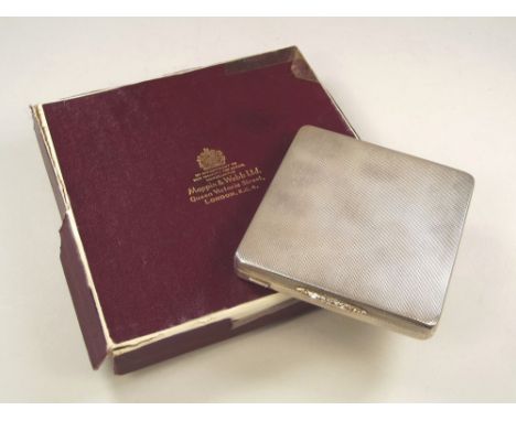 SILVER COMPACT. A Mappin & Webb silver & silver gilt powder compact. Birmingham 1962. Unused & with original presentation box