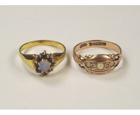 OPAL RINGS. An Edwardian 9ct. gold opal & diamond ring & an opal & sapphire ring.