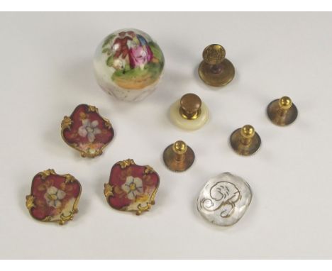 BUTTONS ETC. Three Art Nouveau buttons, a ceramic walking cane finial etc.