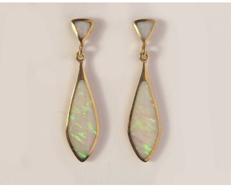 OPAL EARRINGS. A pair of modern 9ct. gold mounted opal drop earrings. Length 4.5cm.