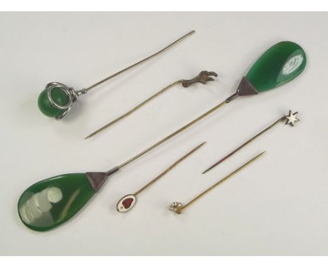 HATPIN ETC. An Art Deco green hardstone hatpin & various other stick pins etc.